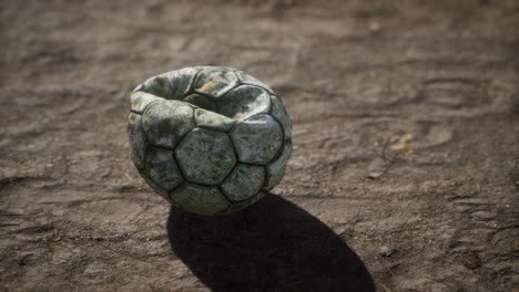 Old-soccer-ball-the-cement-floor